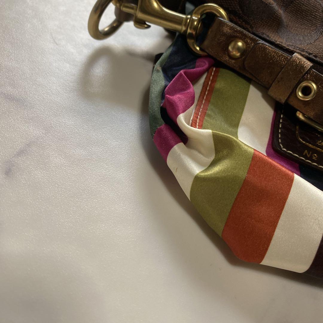 コーチ アクセサリーポーチ ミニハンドバッグ シグネチャー キャンバス 茶