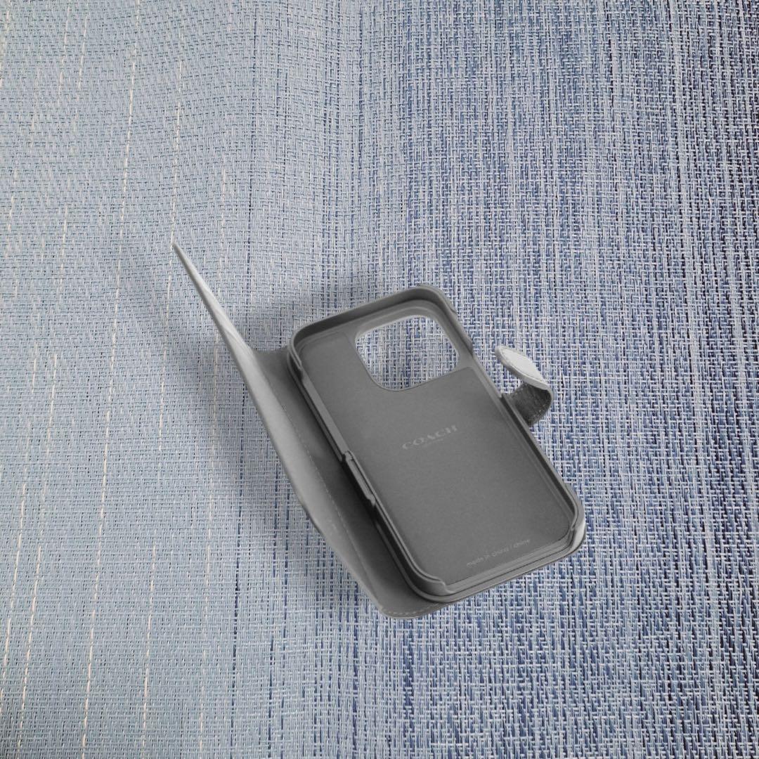 COACH iPhone14PROケース フォリオ・シグネチャー キャンバス
