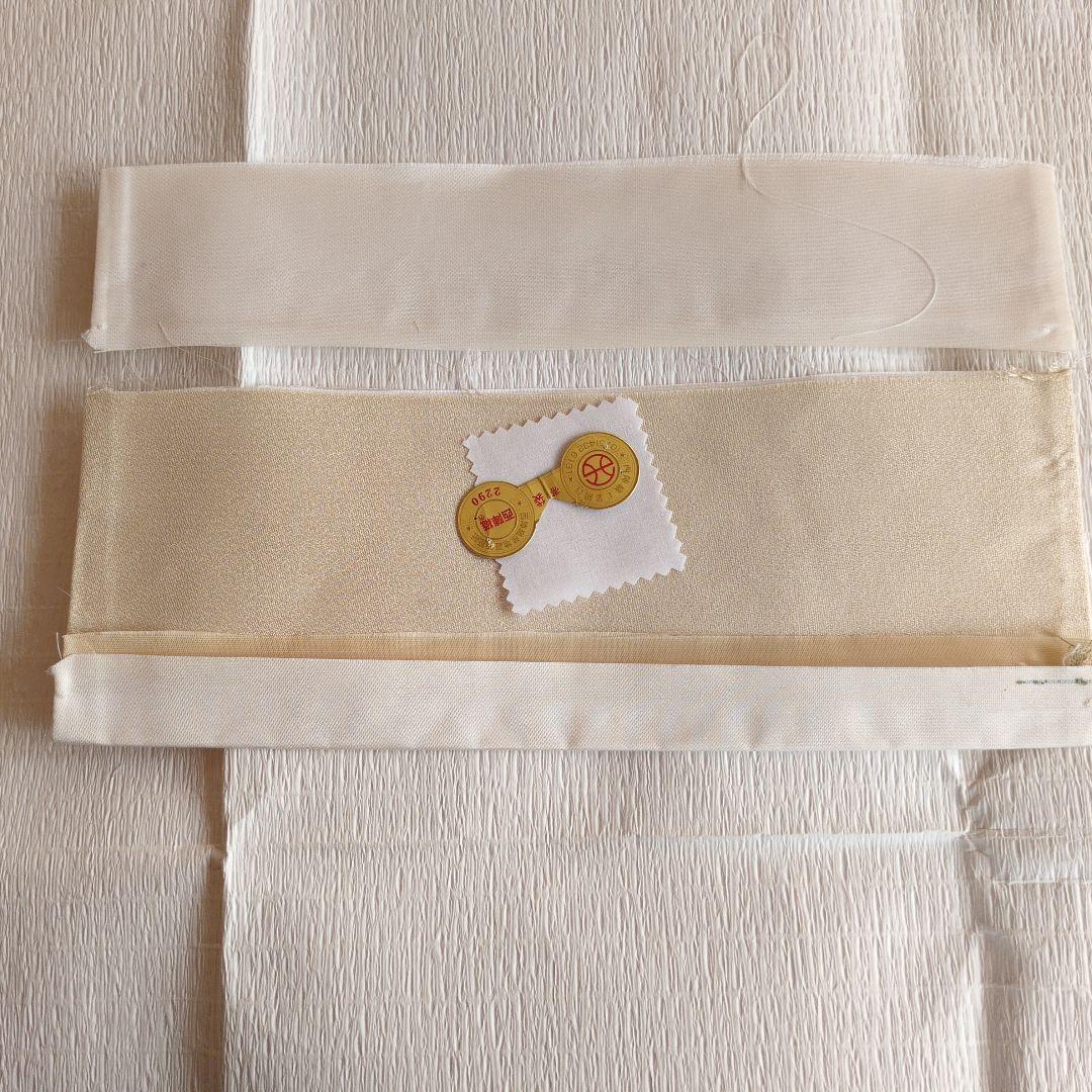 未使用　正絹袋帯　河瀬満織物　横段に花弁散らし　証紙アリ