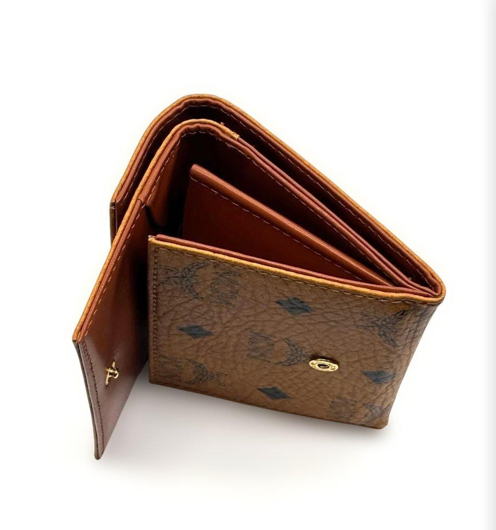 新品・未使用MCM エムシーエム 三つ折り財布 レザーブラウンロゴ入り