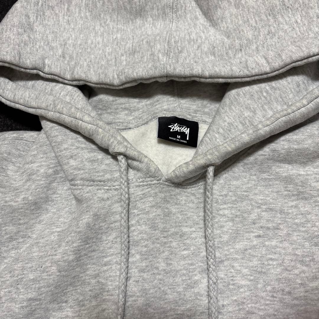 Stüssy グレー パーカー Mサイズ