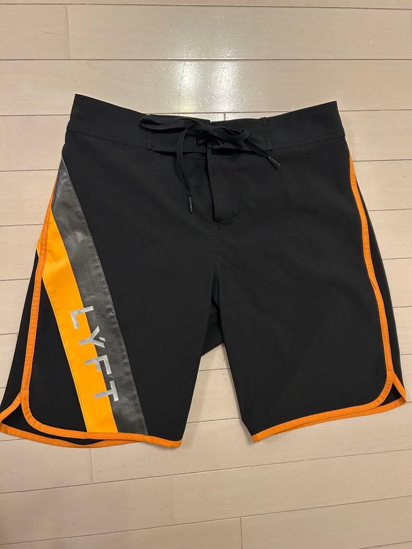 LYFT 【L】ステージショーツ　黒/オレンジ