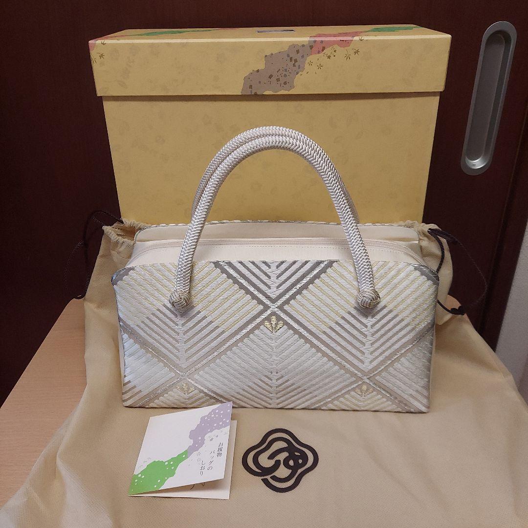 12月7日までのお値下げ　10,000円引　伊と忠　利休バッグ シルバー系 松菱