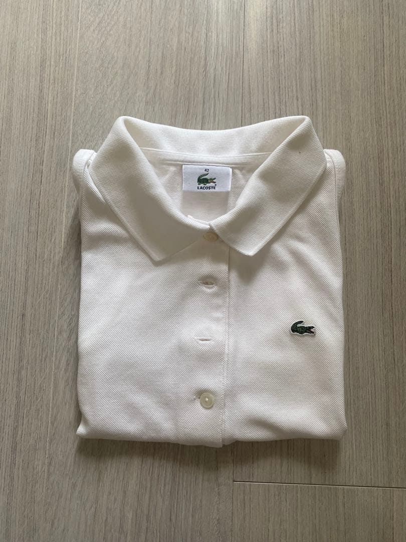 LACOSTE ホワイト ノースリーブポロシャツ