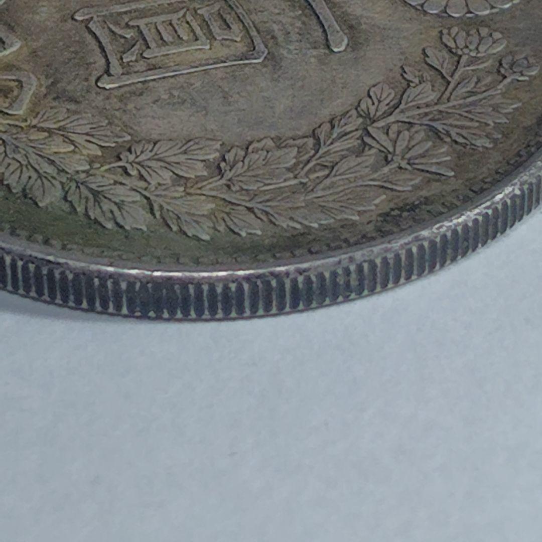 く*ー様 明治18年 一円銀貨（竜）｜銀900｜自然トーン｜VF+相当｜現状品