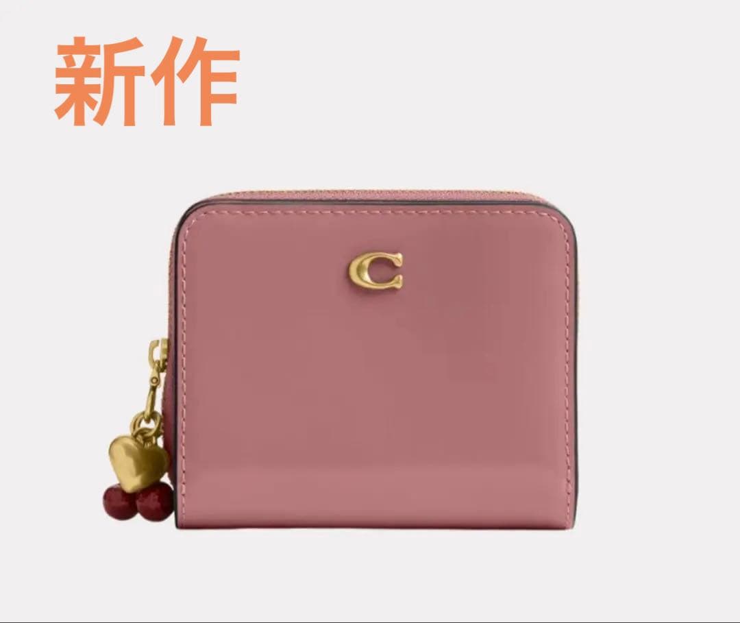 コーチ　エッセンシャル ビルフォールド ウォレット・チャーム　ピンク