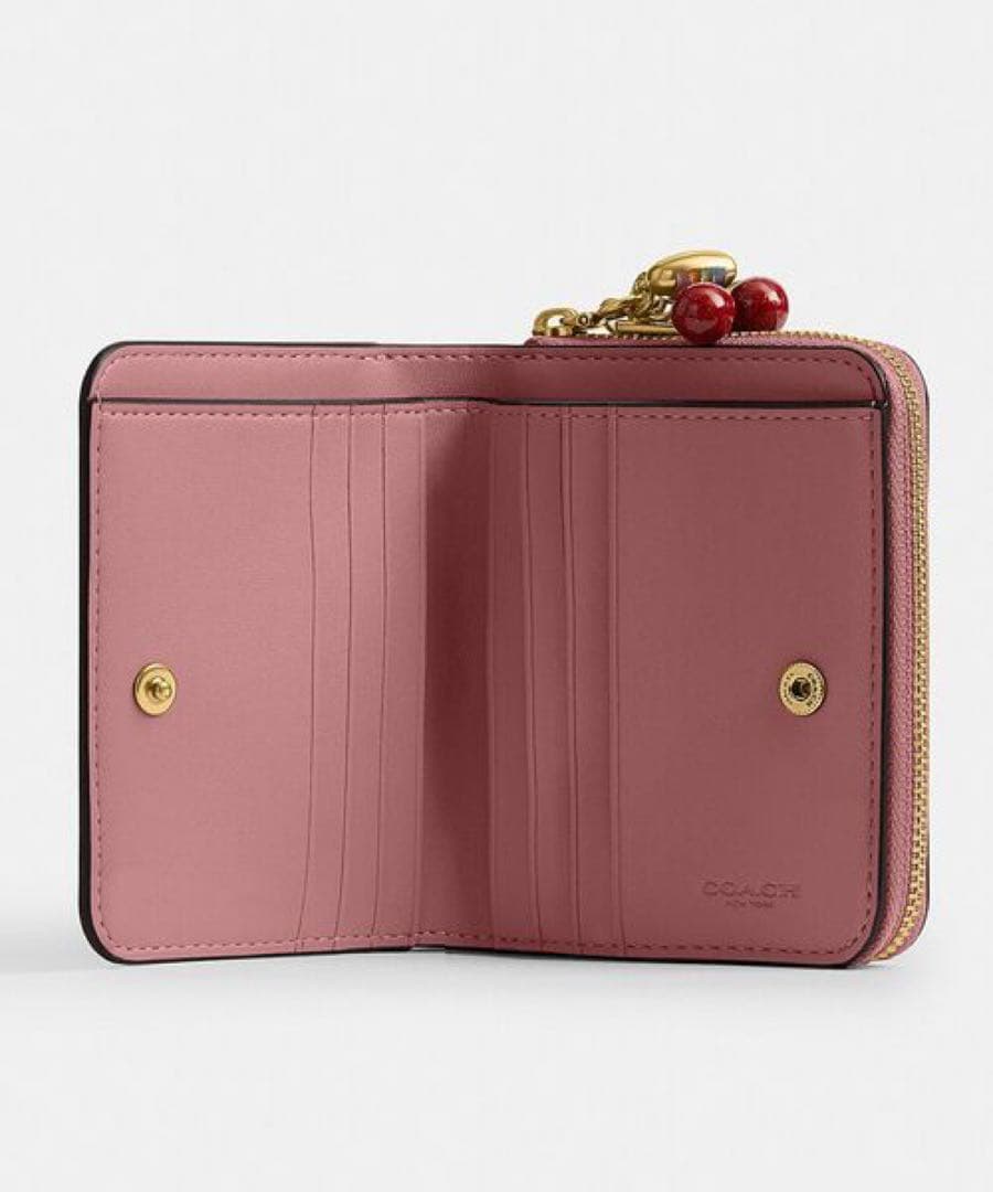 コーチ　エッセンシャル ビルフォールド ウォレット・チャーム　ピンク