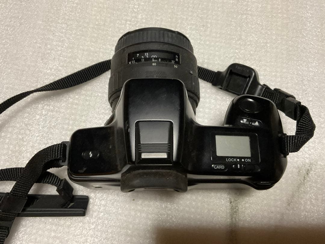 MINOLTA／アルファー・5700i。【シグマレンズ付き。持ち手僅かにキズ】。