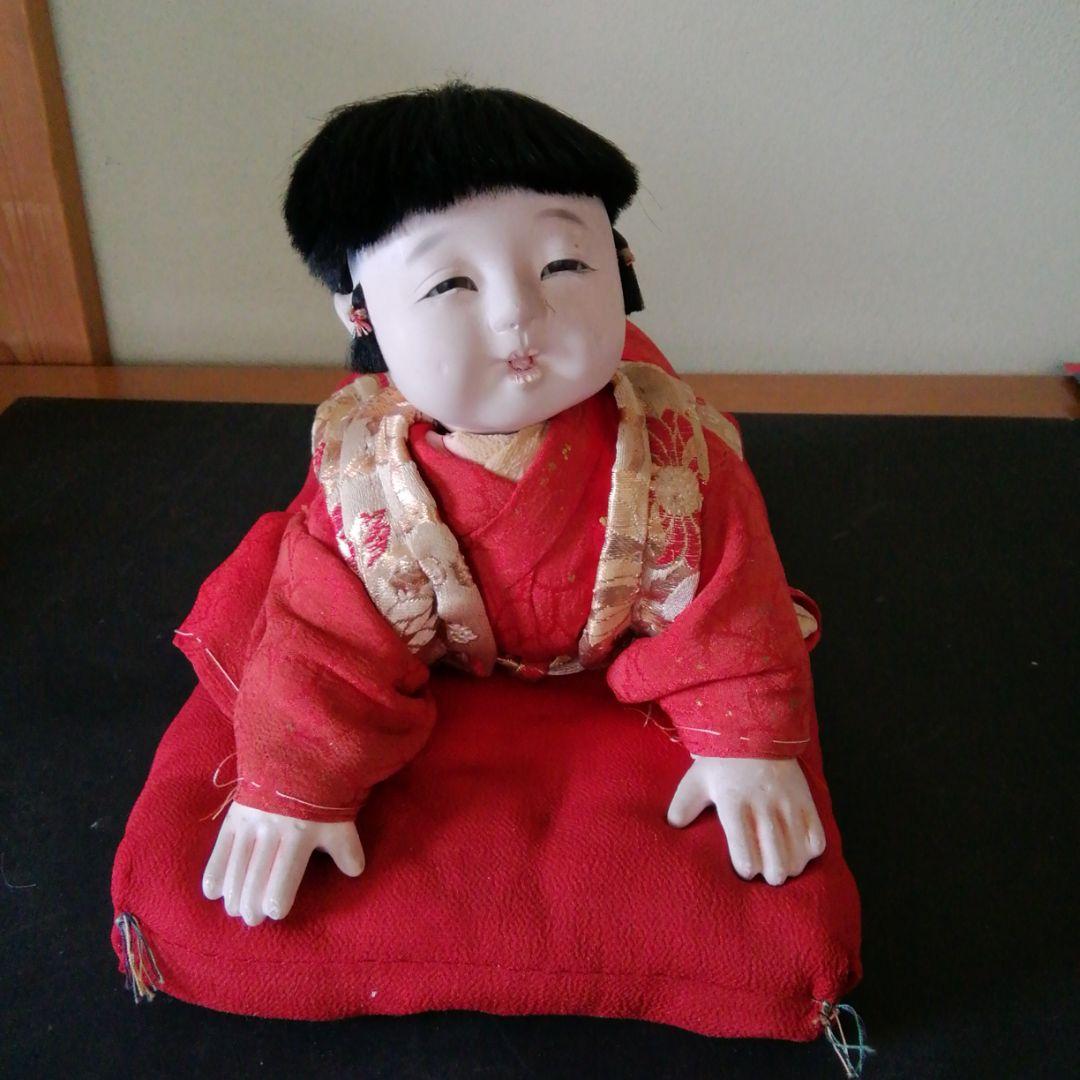 ハイハイ人形。