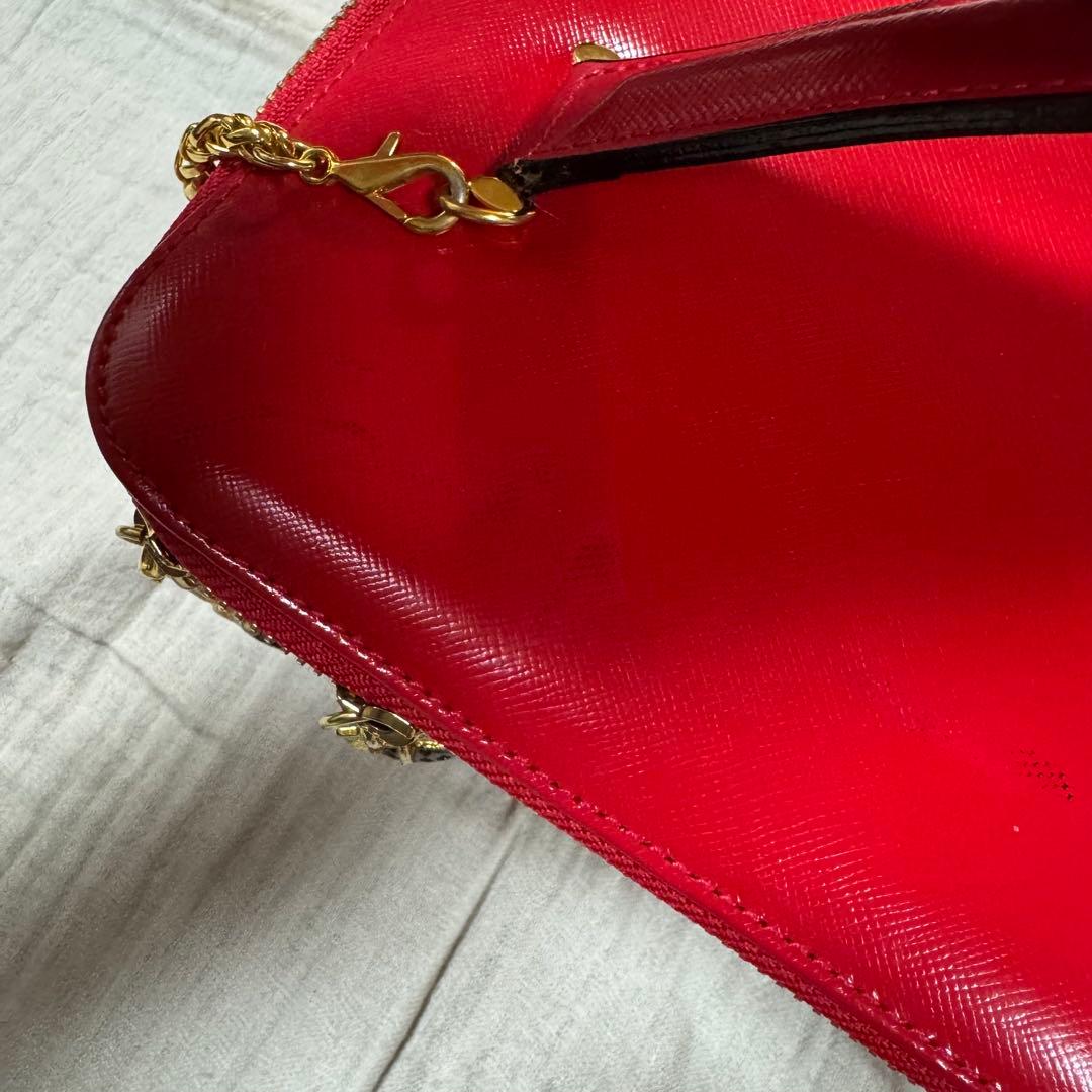 美品 VERSACE レザー バニティバッグ 赤　ファスナー チャーム 太陽