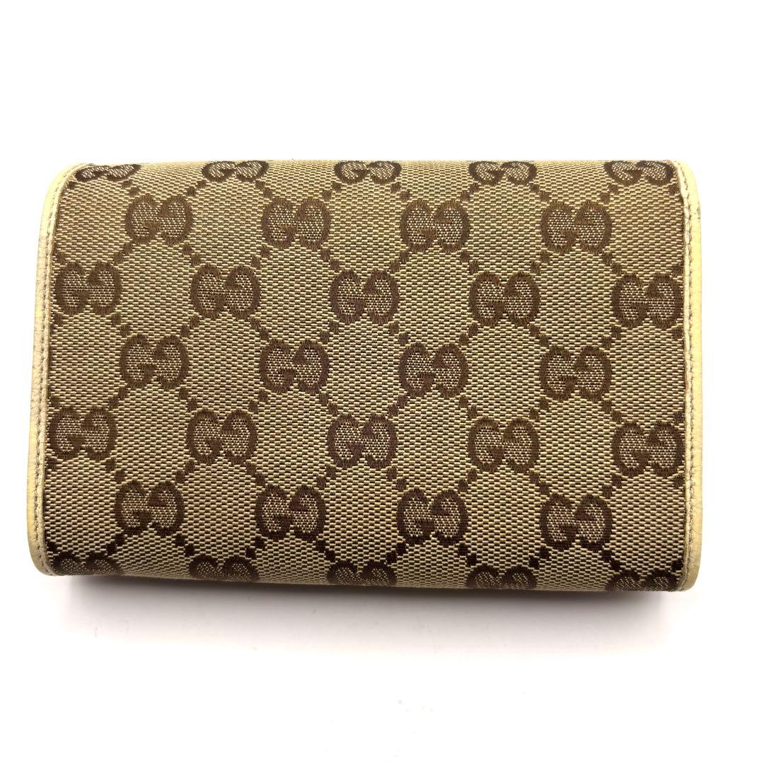 グッチ 折り財布 GGキャンバス ロゴ プレート アイボリー ファスナー
