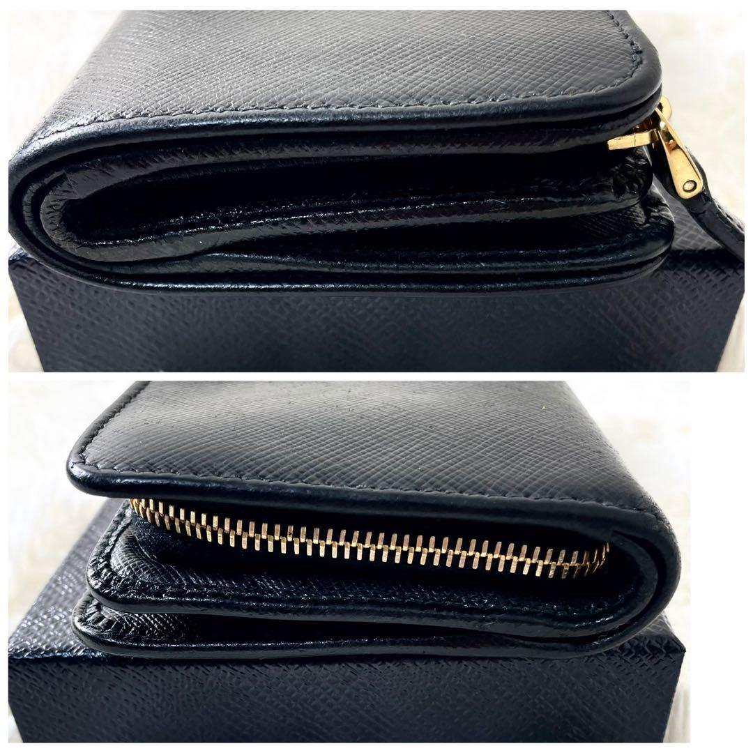 プラダ　PRADA 二つ折り財布　サフィアーノ　レザー　ブラック　黒　レディース