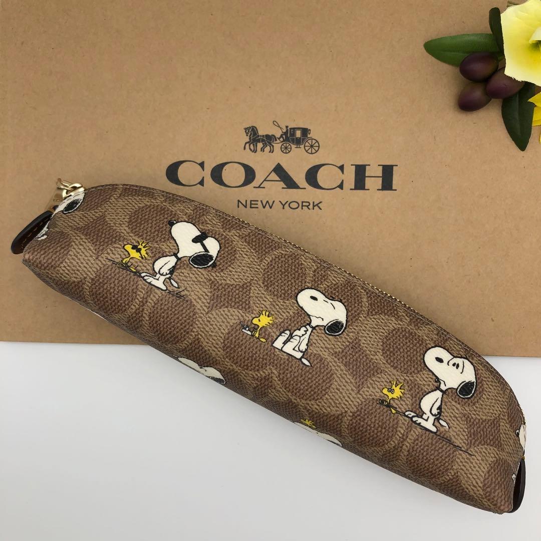 COACHxPEANUTSコラボ ★大人気★ ペンシルケース スヌーピー 新品