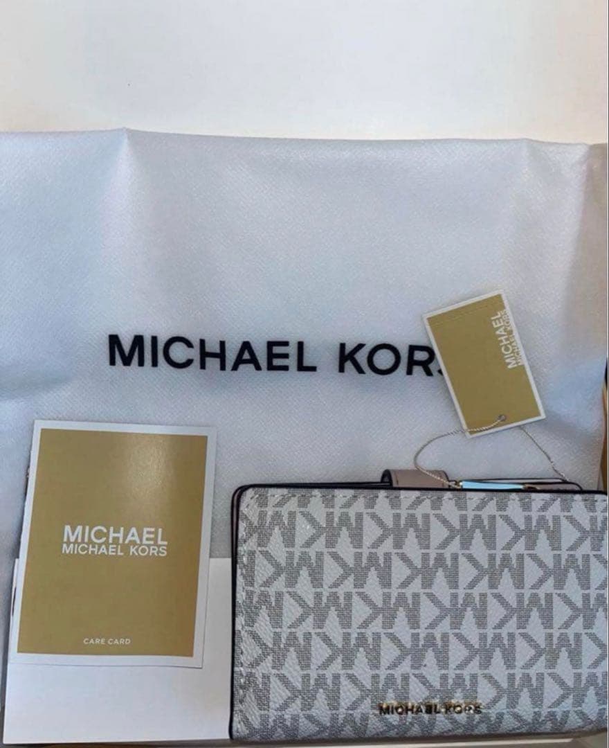 【新品】マイケルコース　タブウォレットミディアムMKシグネチャー　財布