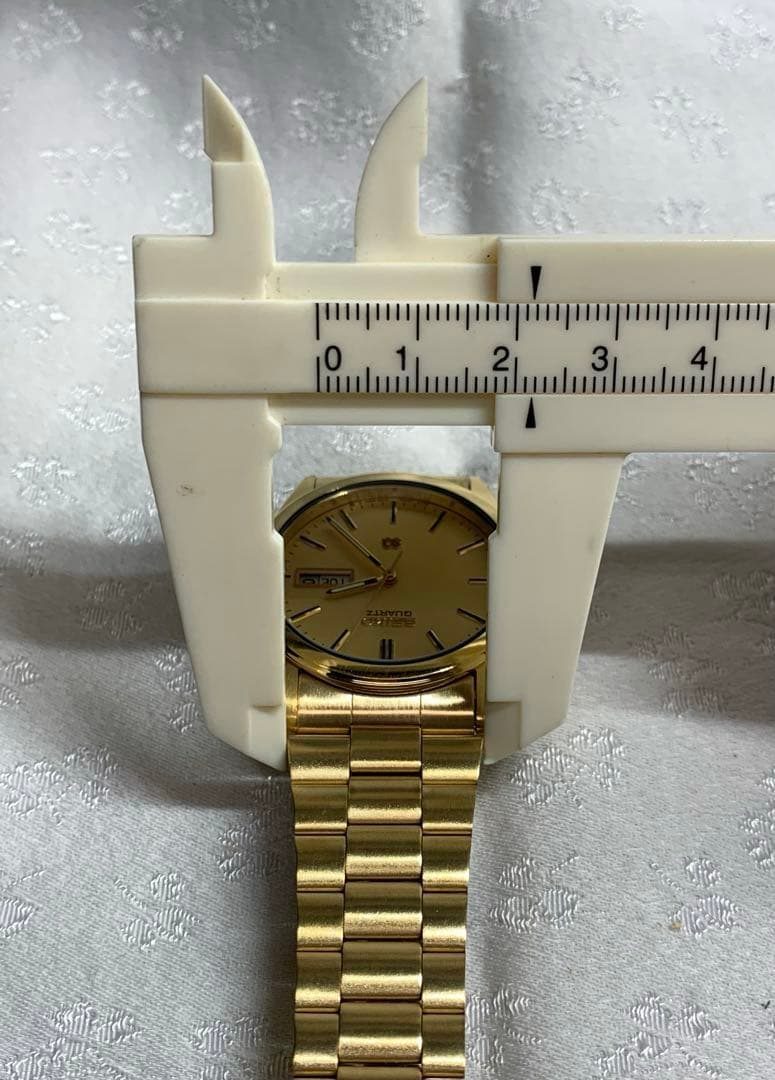 SEIKO SQ 腕時計　メンズ 金色　電池交換済　稼動品