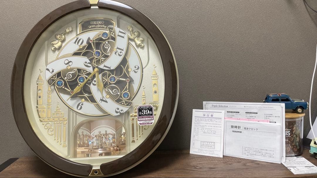 【新品、未使用】電波時計 セイコー 掛時計 壁掛け時計　メロディ機能付き回転飾り