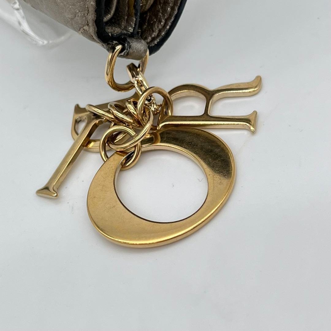 【美品】クリスチャンディオール 二つ折り財布 カナージュ ロゴ金具 レザー