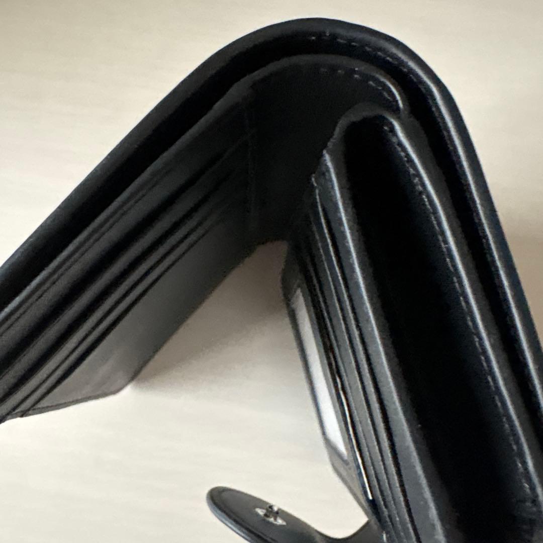 p*o様 COACH フラワーパターン 二つ折り財布