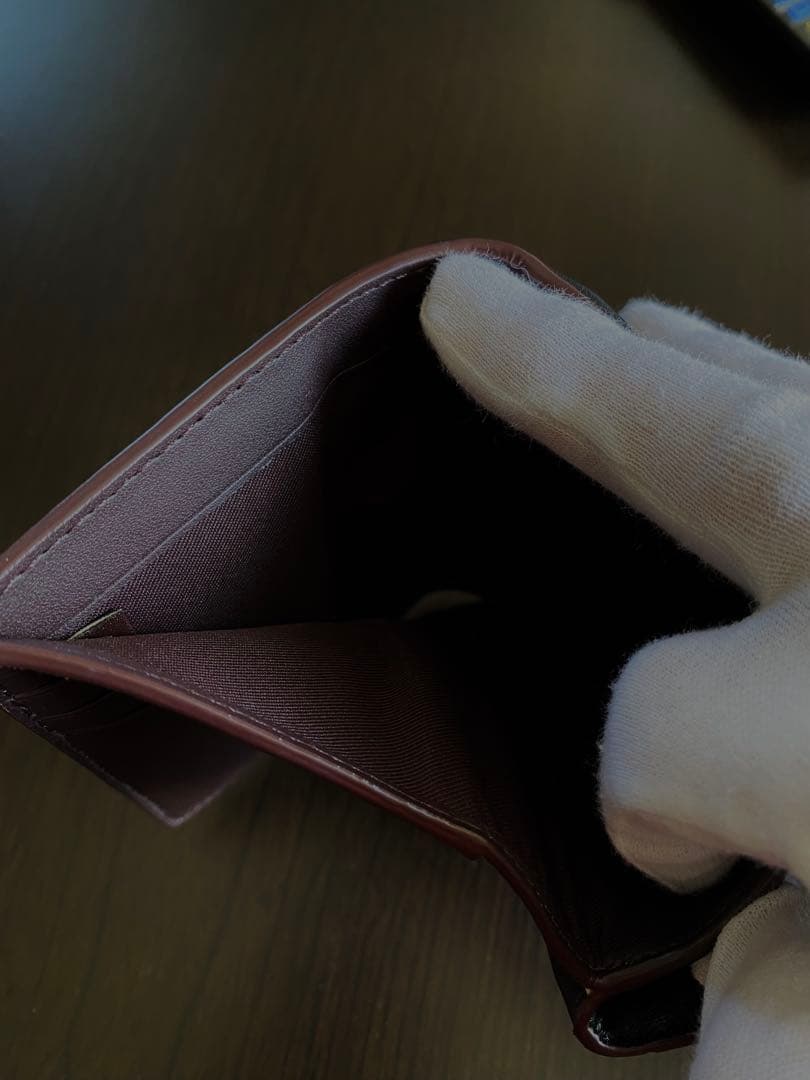 COACH エンボス加工 ブラック 二つ折り財布