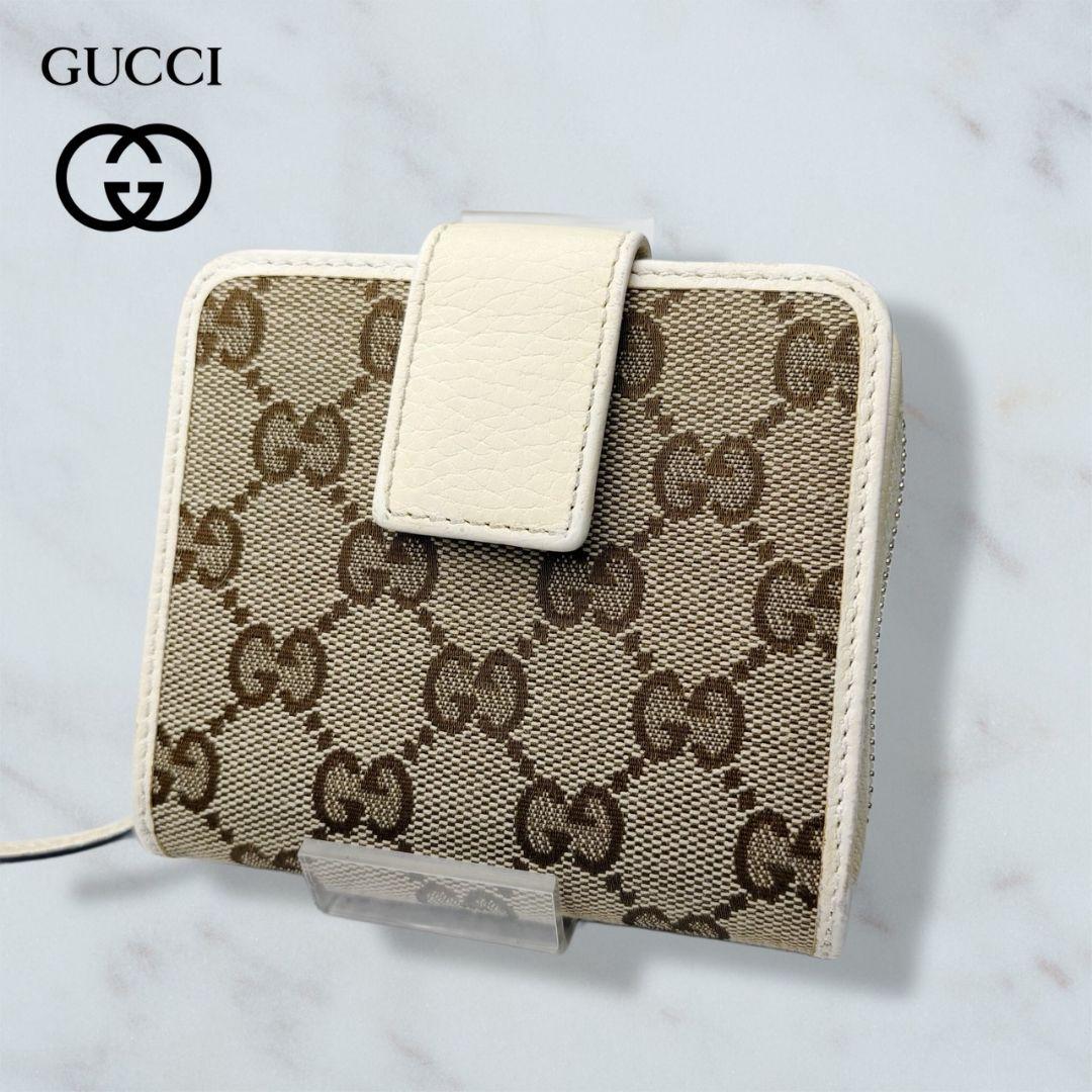 38 GUCCI 二つ折り財布 GGキャンバス xm3
