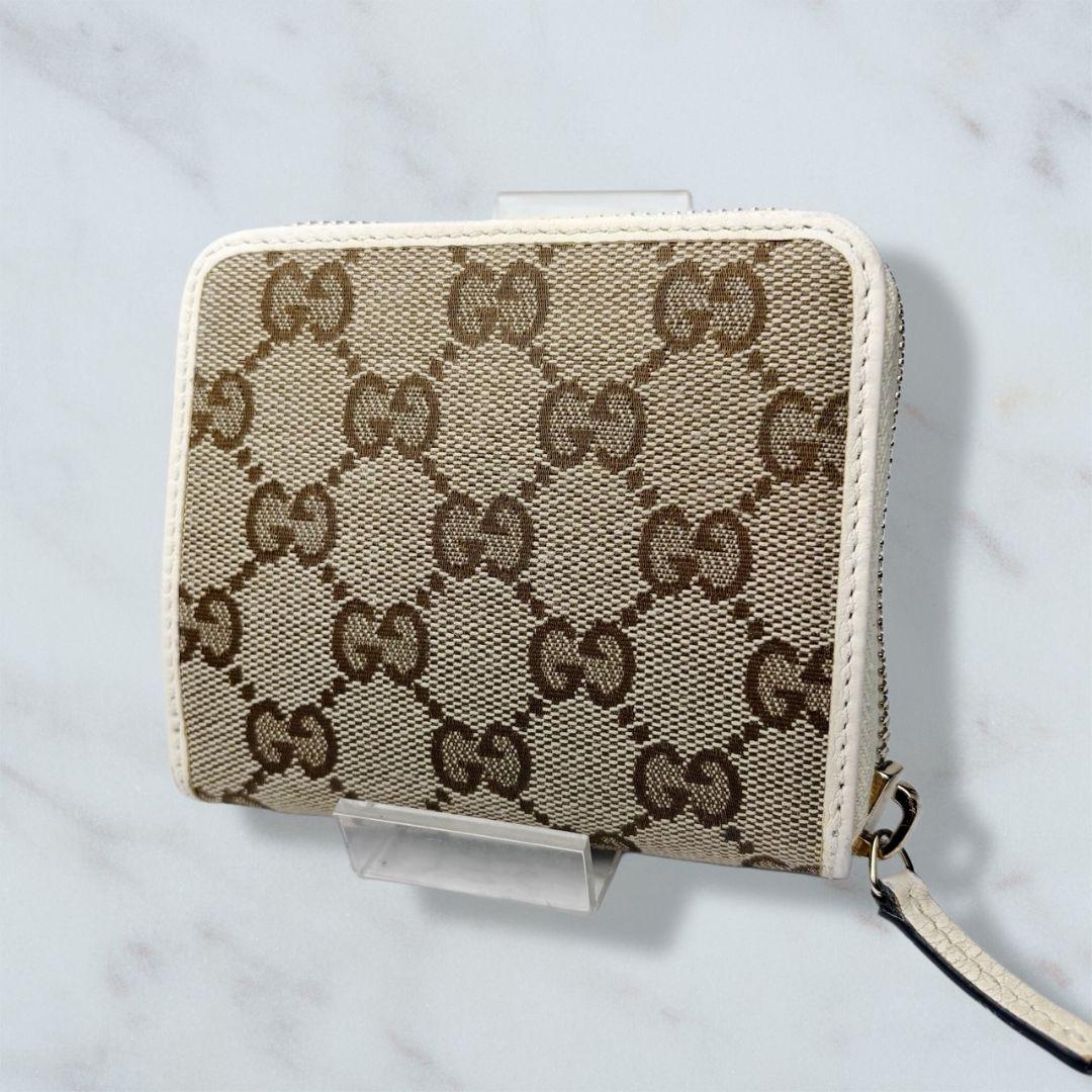 38 GUCCI 二つ折り財布 GGキャンバス xm3
