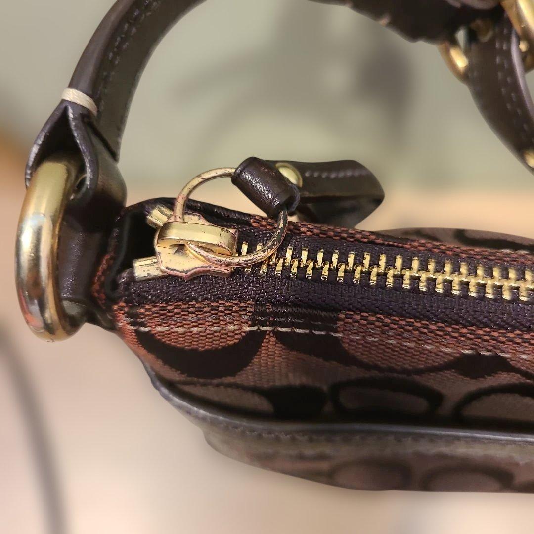 コーチ アクセサリーポーチ ワンショルダーバッグ シグネチャー ターンロック 茶