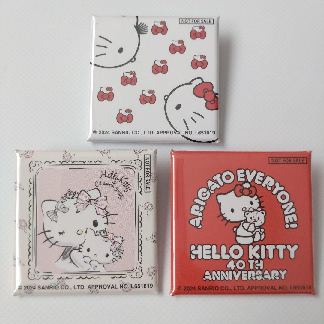 キティ 50周年記念カフェ 缶バッジ 巾着 ステッカー ショッパー