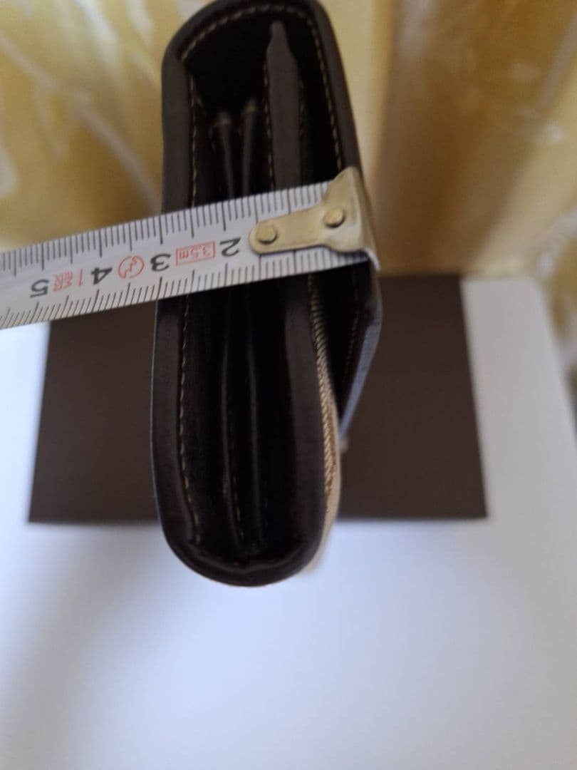 せ*ン様 GUCCI 二つ折り財布 GGパターン