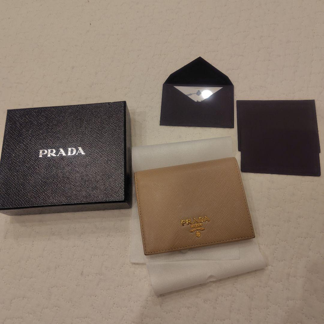 M*a様 【美品】PRADA 二つ折り財布 レザー ベージュ