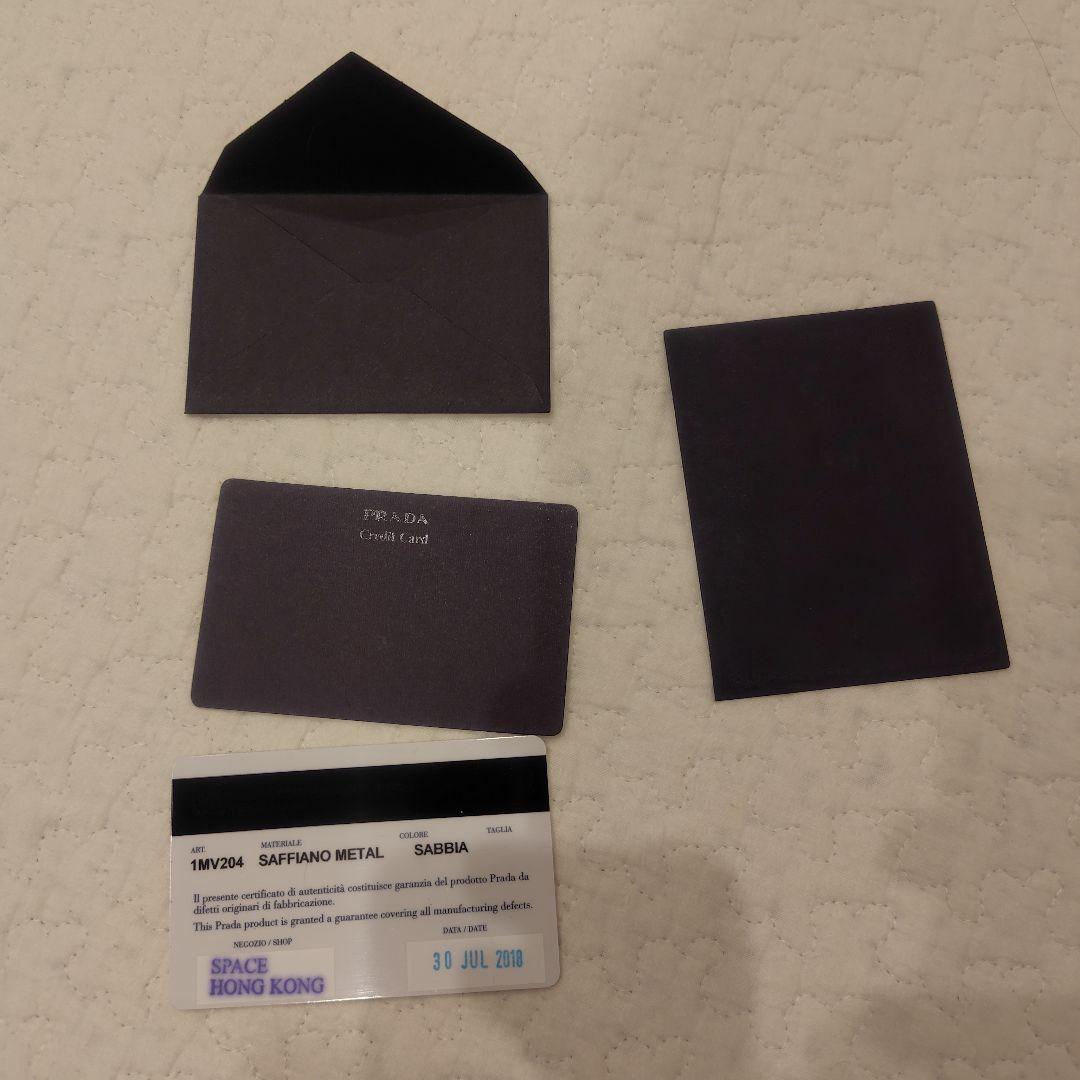 M*a様 【美品】PRADA 二つ折り財布 レザー ベージュ