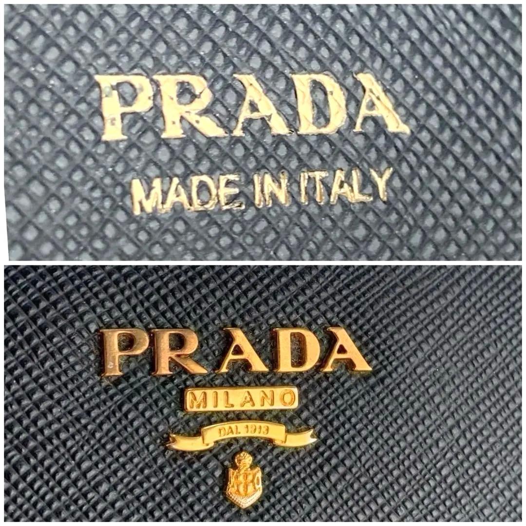 プラダ　二つ折り財布　ネイビー　レディース