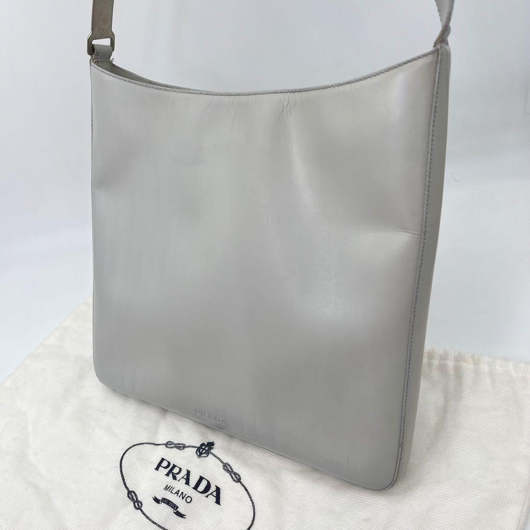 PRADA ワンショルダーバッグ 肩掛け ロゴ金具 カーフレザー オフホワイト