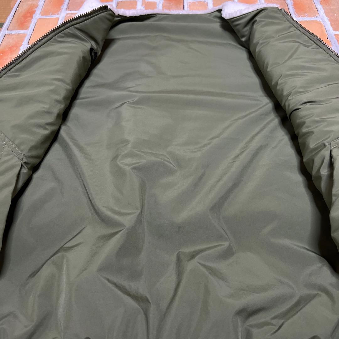 201NIKEリバーシブルベスト　ナイキボアモコモコウインタライズドスウォッシュ