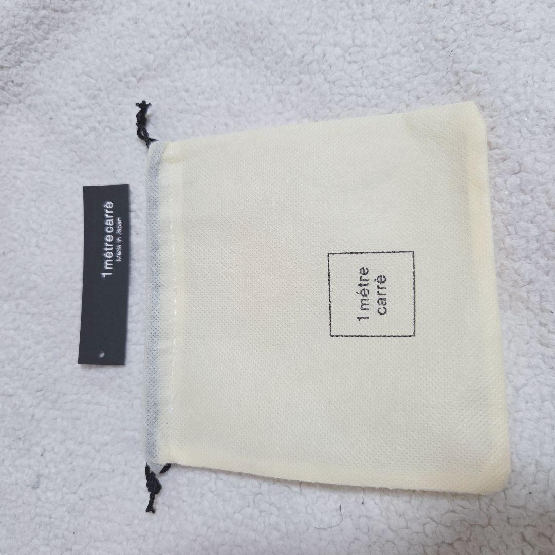 アンメートルキャレ 三つ折り財布 星モチーフ　 シャンパンゴールド