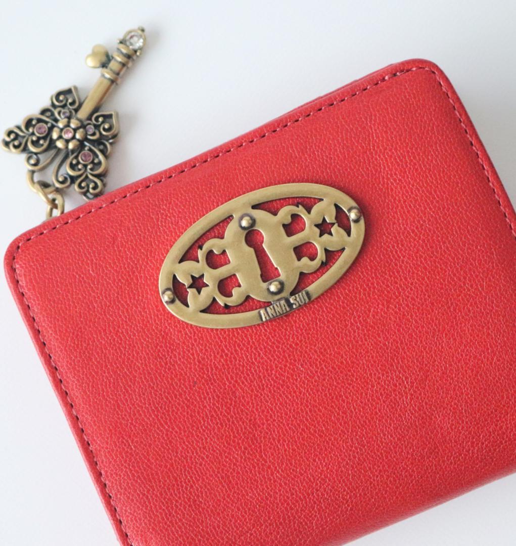 新品タグ付き【アナスイ】開運バタフライキー 鍵穴モチーフ 山羊革 二つ折り財布