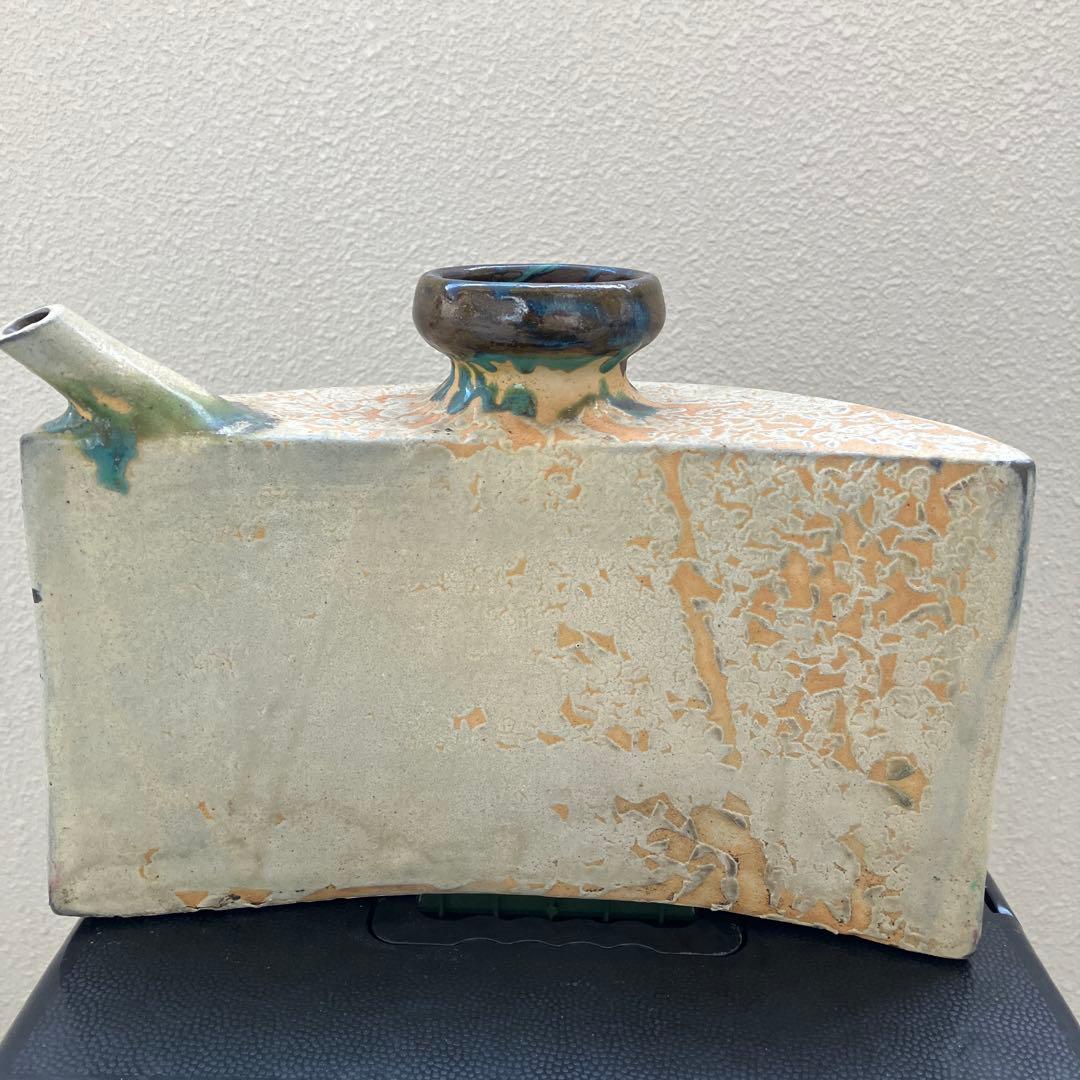 金城次郎　抱瓶