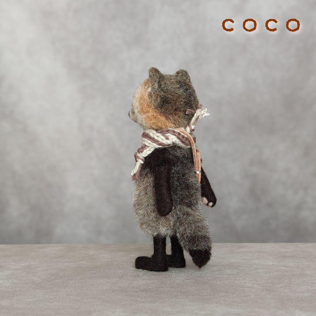 柿ポシェットを下げたたぬきさん