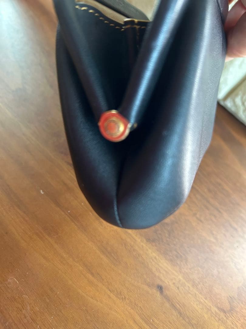 COACHコーチ黒のがま口ケース小銭に入れ