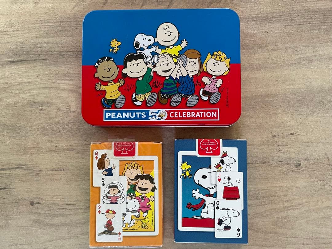 ピーナッツ生誕50周年記念アニバーサリーコレクター缶（トランプ2組付)スヌーピー