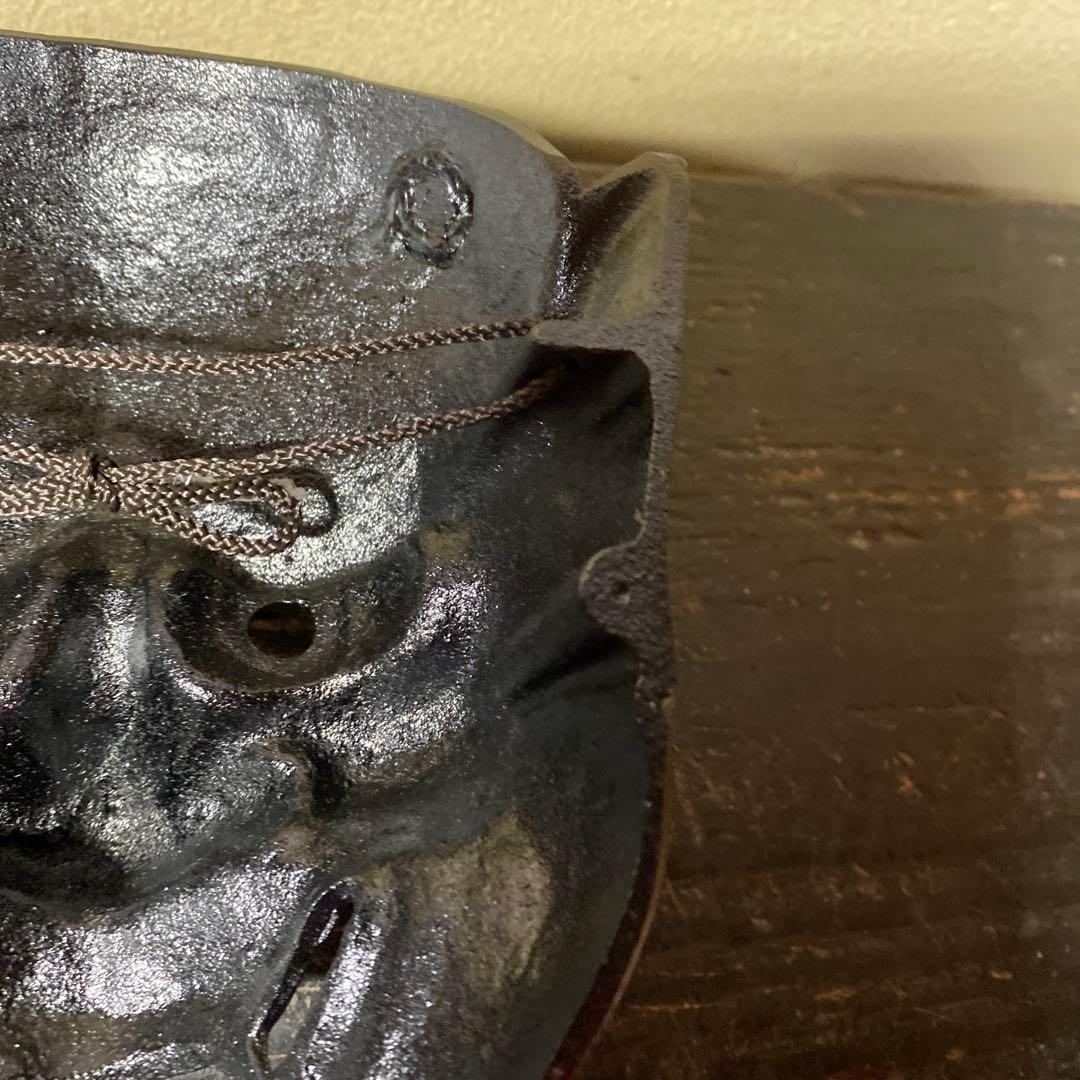 鬼の面 黒色 金色の歯