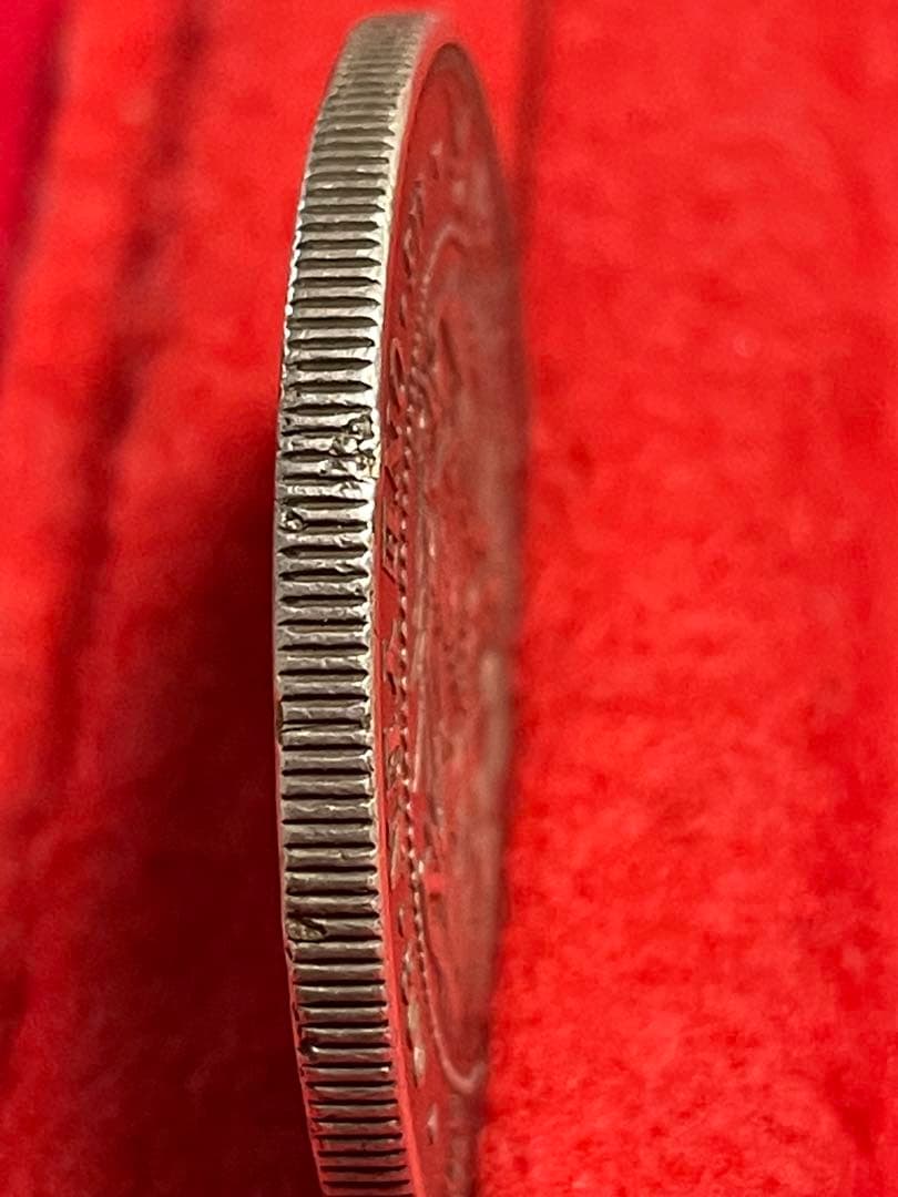 No.0706 古銭 新一円銀貨銭　明治22年　うぶだし　エッジ一ヶ所当たり