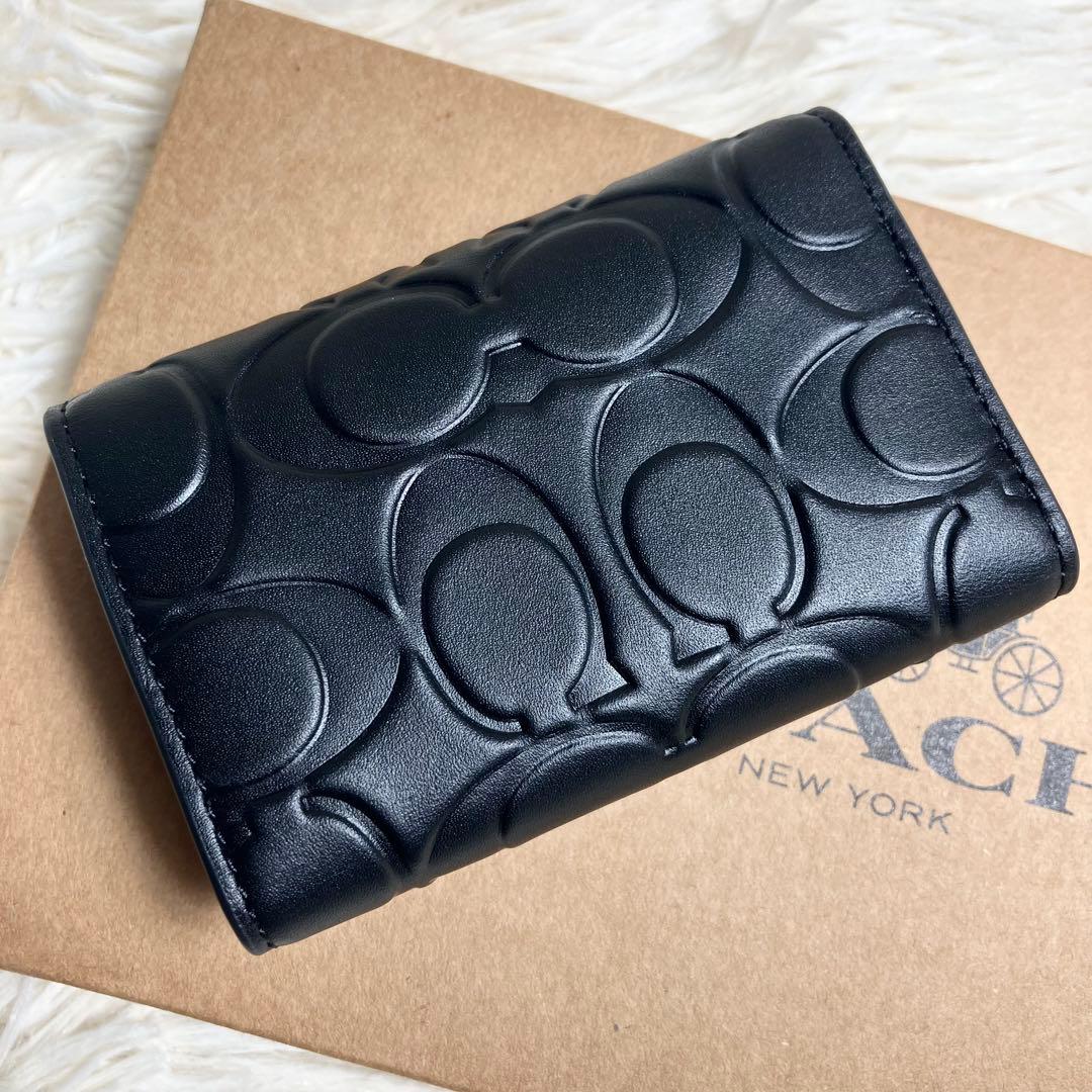 未使用品 COACH エンボス シグネチャー キーケース レザーブラック