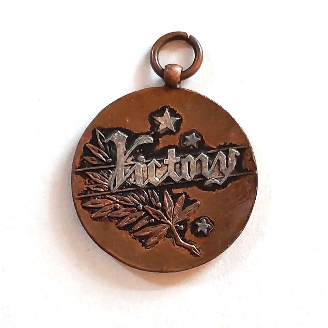 北越新報社 寄贈 メダル