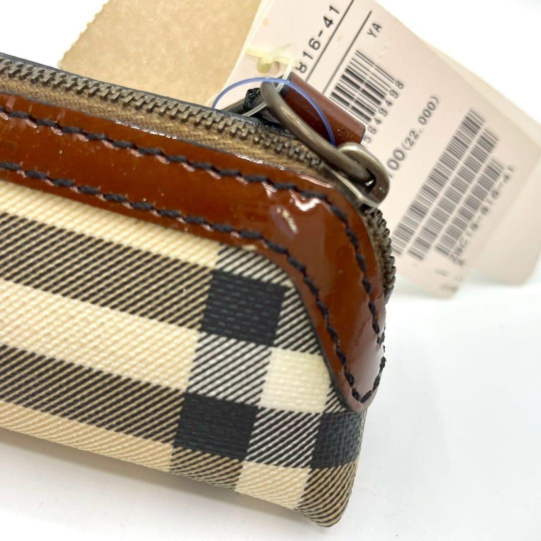 新品タグ付き Burberry 小物入れ ポーチ ノバチェック　レザー　PVC