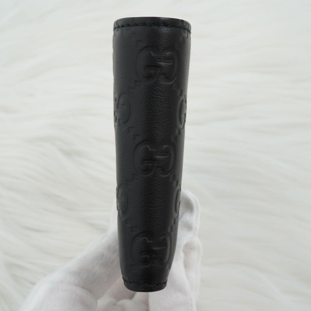 未使用品　箱付き　GUCCI グッチ　二つ折り財布　GG柄　シマ　ブラック