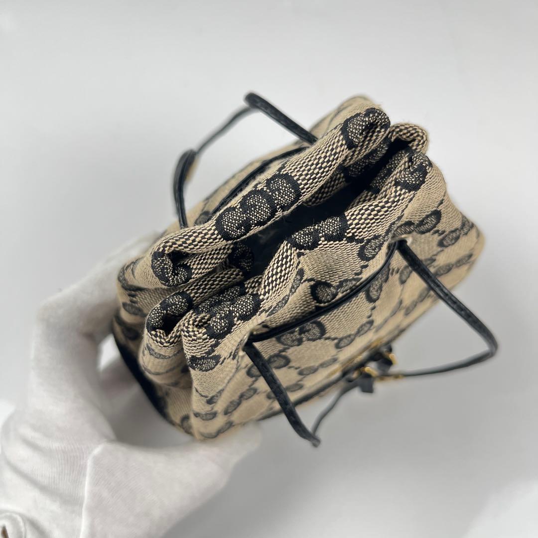 【極美品】GUCCI GGキャンバス プレート バニティポーチ 巾着 ミニバッグ