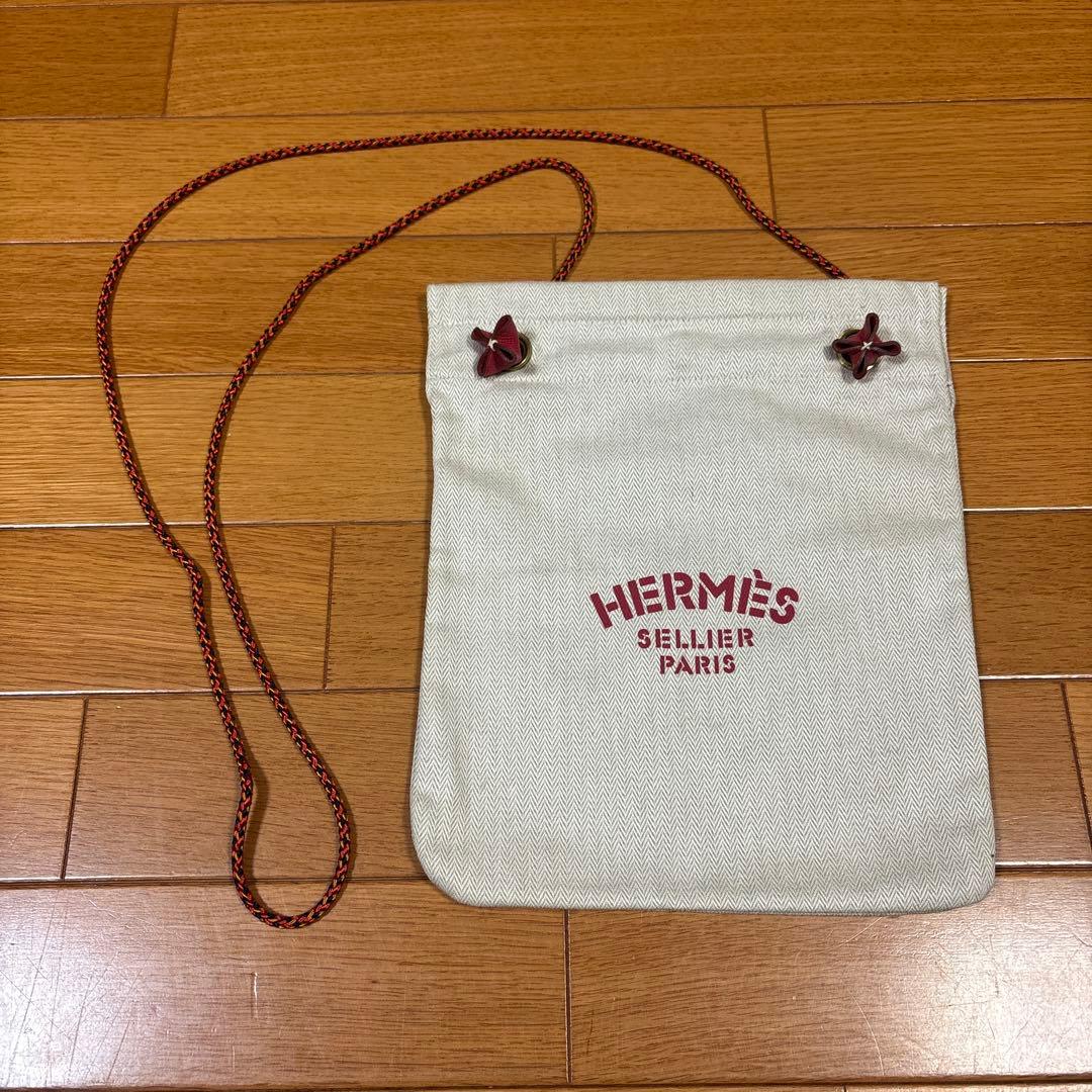 HERMÈS エルメス 巾着ポーチ ロゴ入り 紐付き ベージュ系
