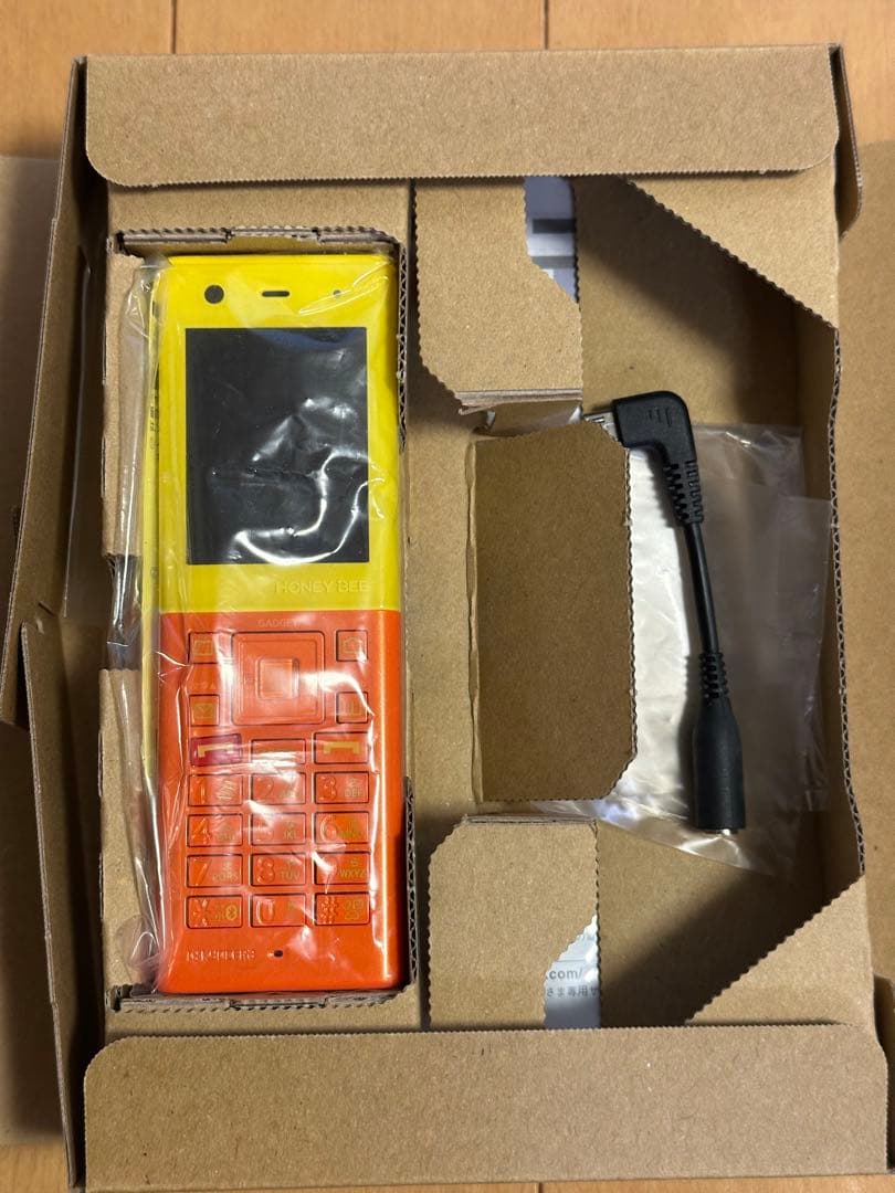 KYOCERA HONEY BEE WX07K 本体　イエロー×オレンジ