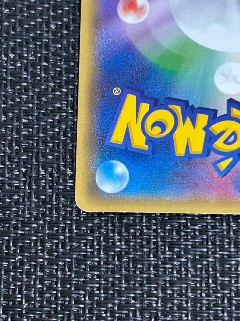 リザードンEX：ユニクロ「ポケモンカードゲームＴシャツ」 PROMO XY ①