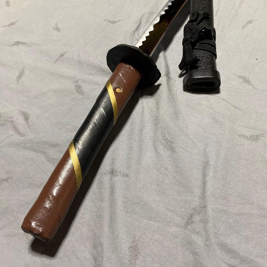 模造刀 ツートン皮巻柄 楕円鍔 黒粒黒鞘